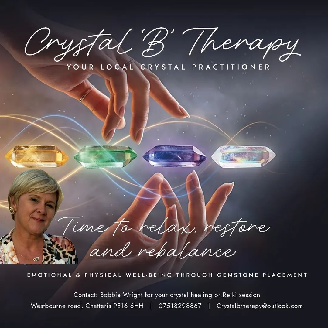 Crystal B Therapy promotional display with Bobbie, healing crystals and contact details